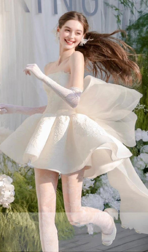 Shop  beautiful dress - Perfect for special occasions | Dervla Strapless Bow Mini Dress