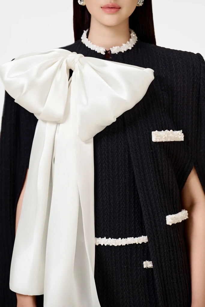Shop  black dress - Perfect for special occasions | Abene Bow Beaded Embellished Knit Cape - Black